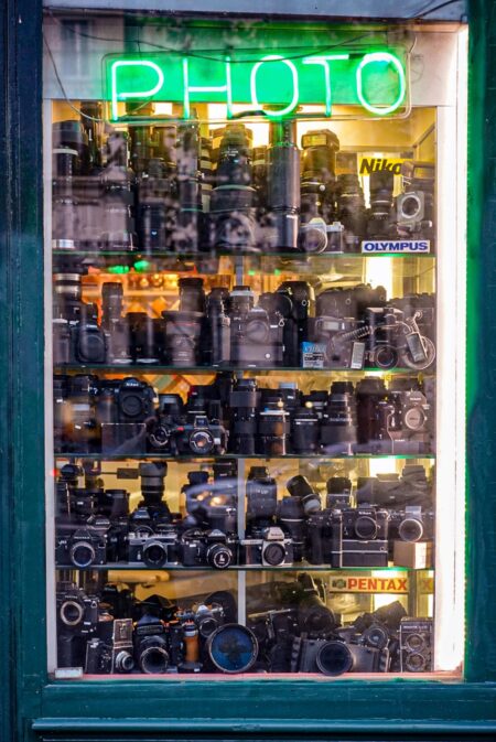 vintage camera store with lenses in the window