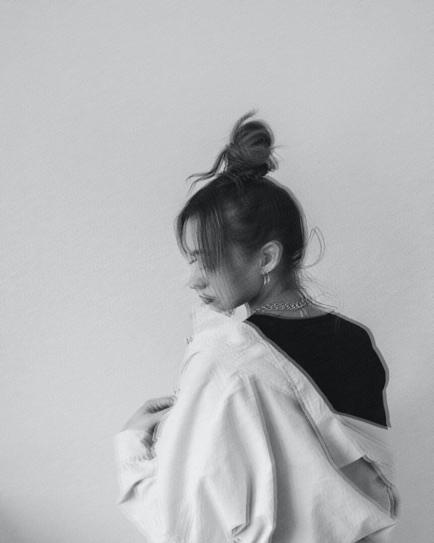 black and white blurry portrait of a girl in the vintage aesthetic