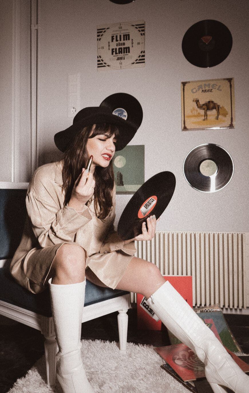 film portrait of a girl holding a vintage record