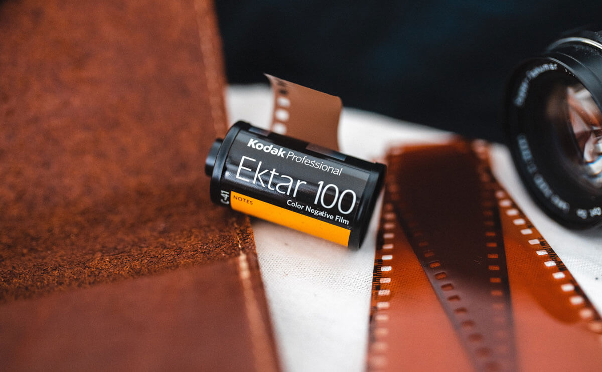 roll-of-kodak-ektar-100-film-on-table