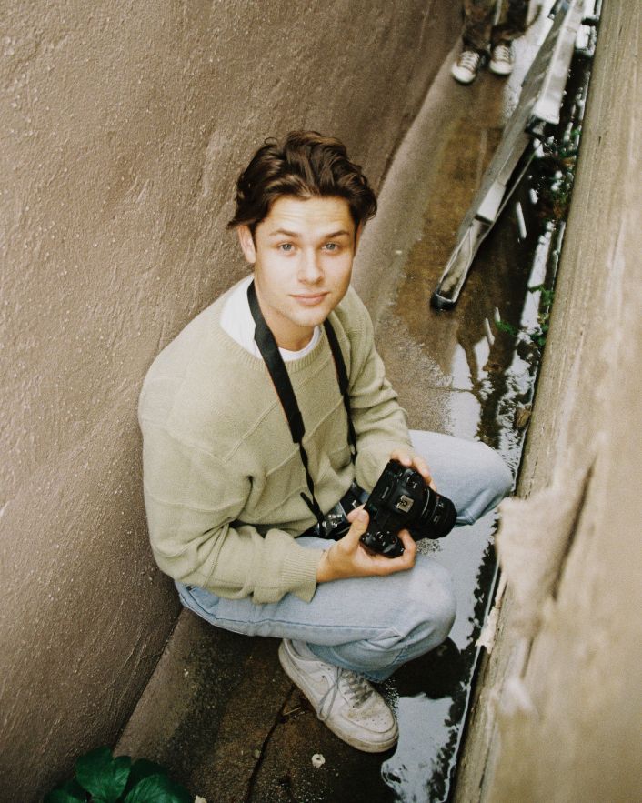 vintage portrait of boy in alleyway