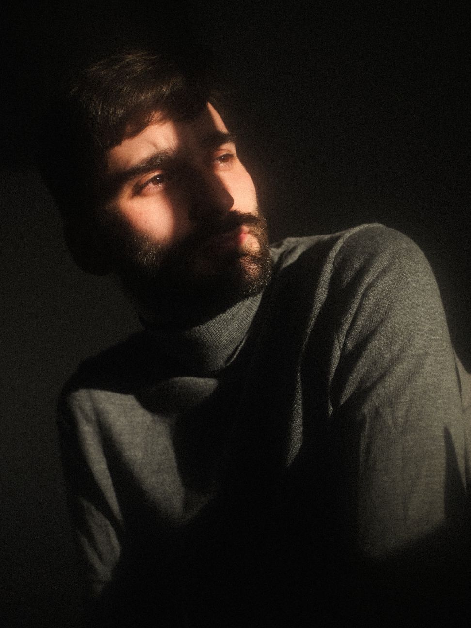 vintage portrait of man with light on his face