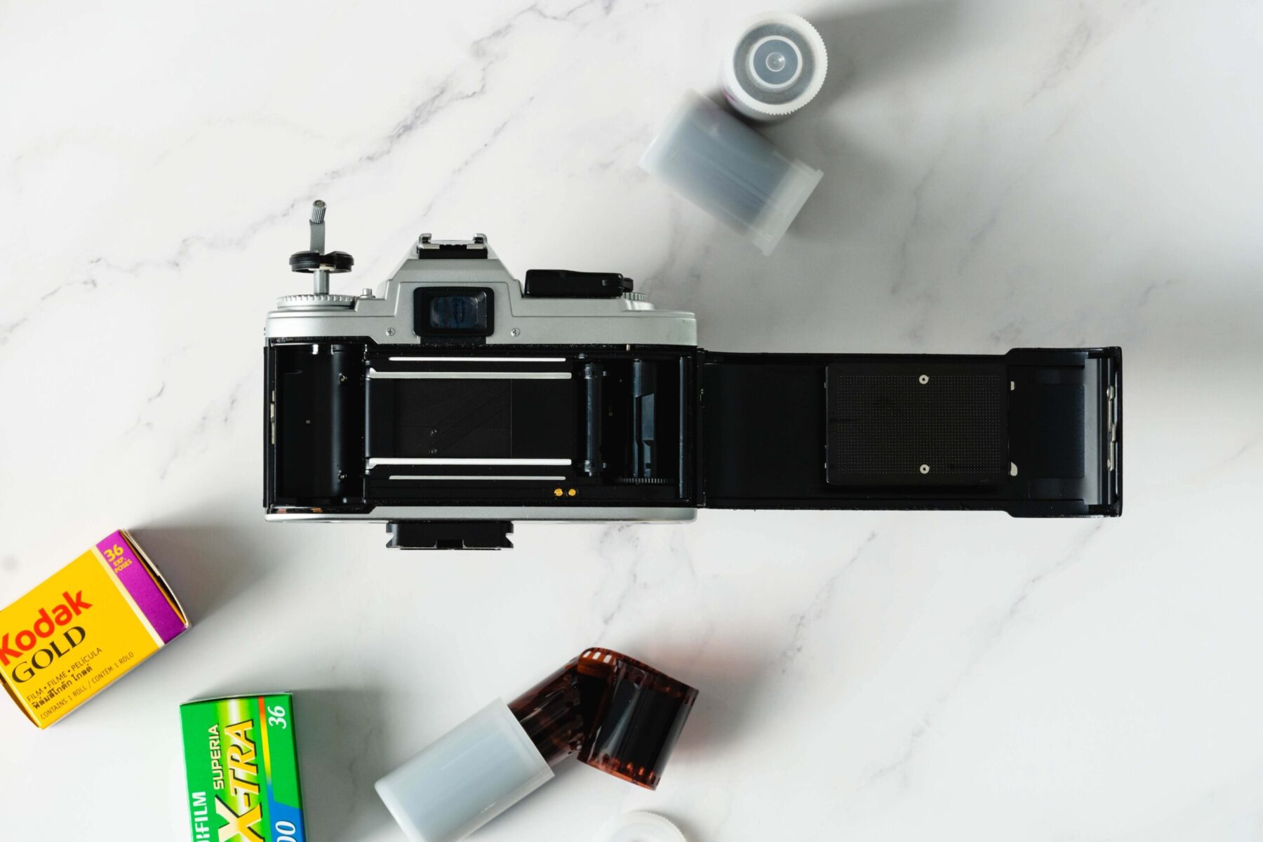 best 35mm film stocks with a film camera flatlay