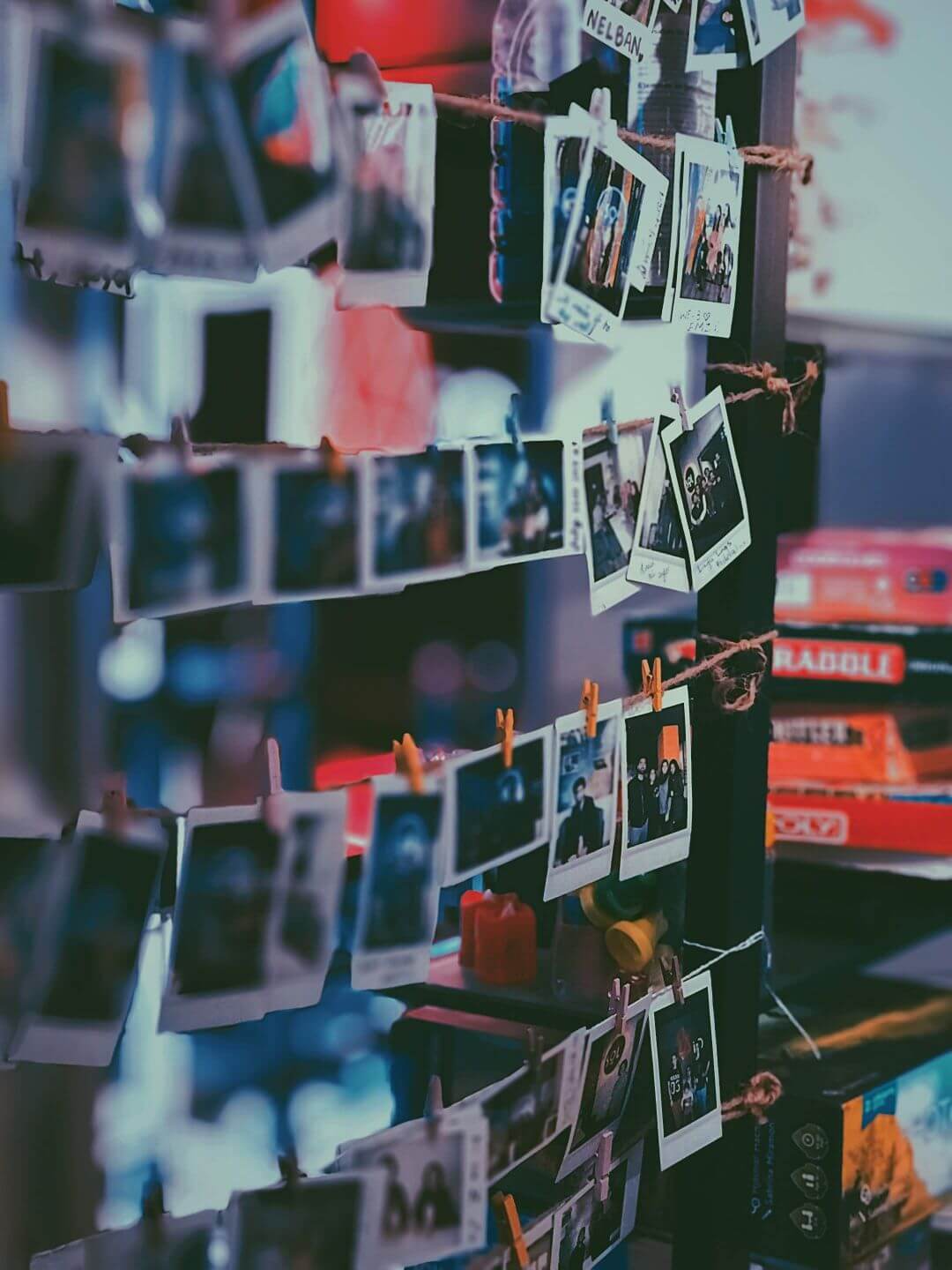 wall of polaroid photos hanging